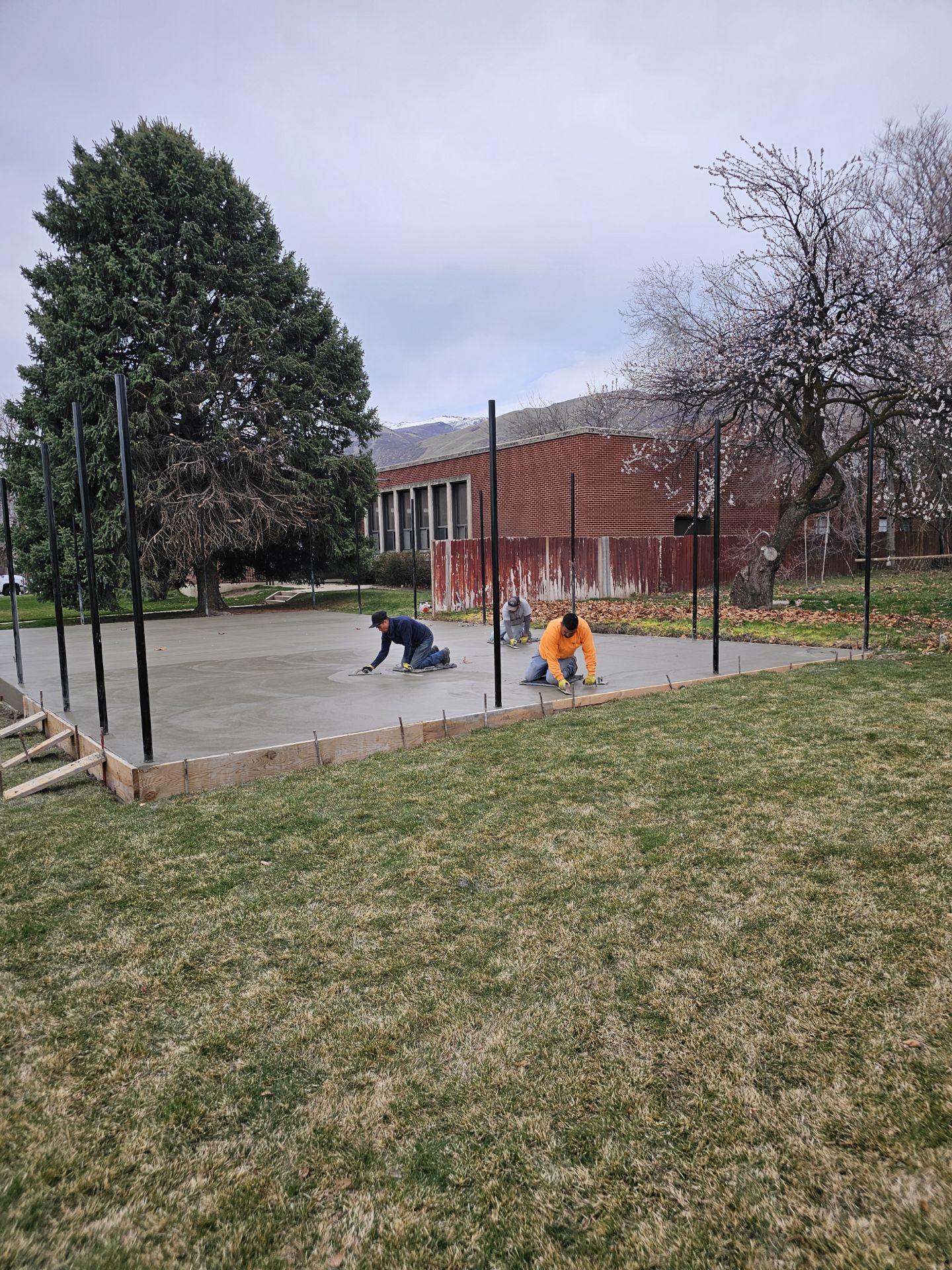Concrete patio finishing crew in Utah