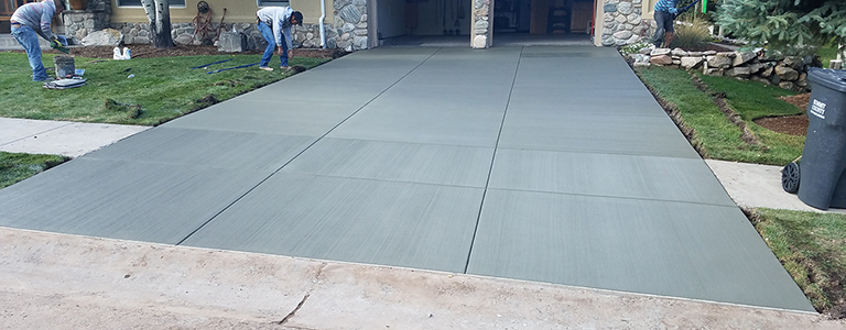 Concrete driveway project by West Jordan Concrete LLC in Utah