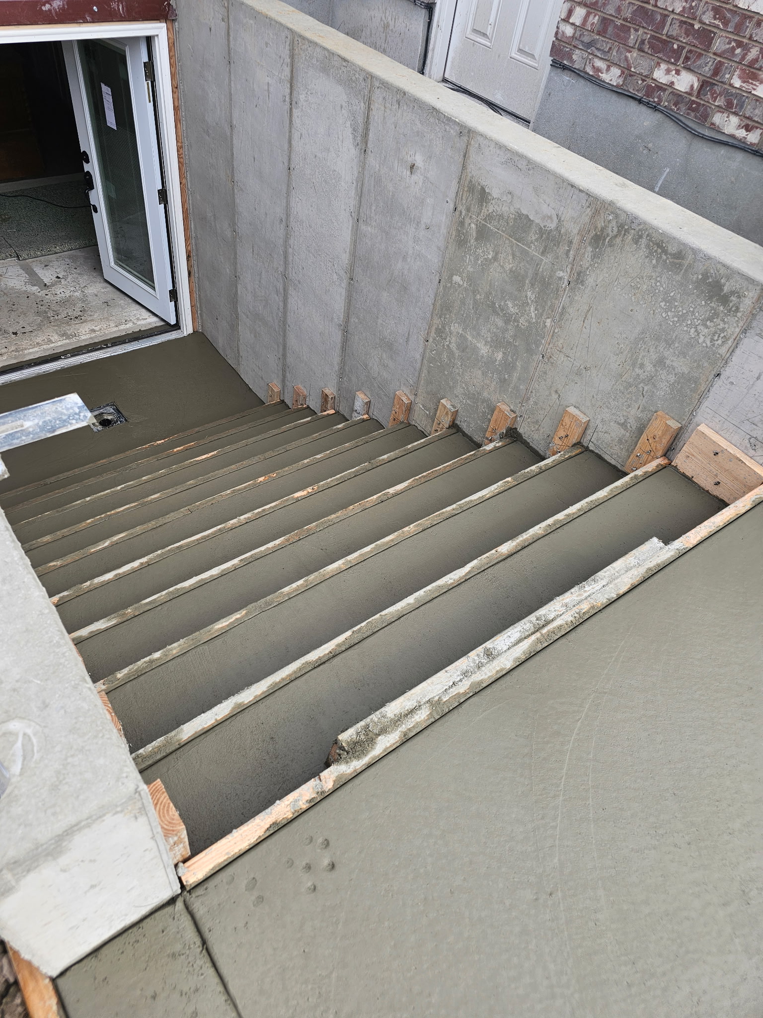Walkout basement foundation wall forms installed for a residential concrete project in Utah